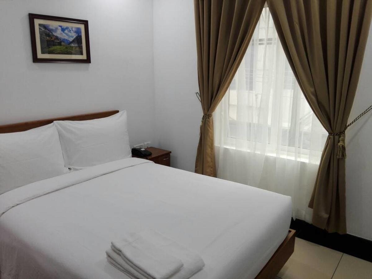 Pgs Inn Kochi Buitenkant foto
