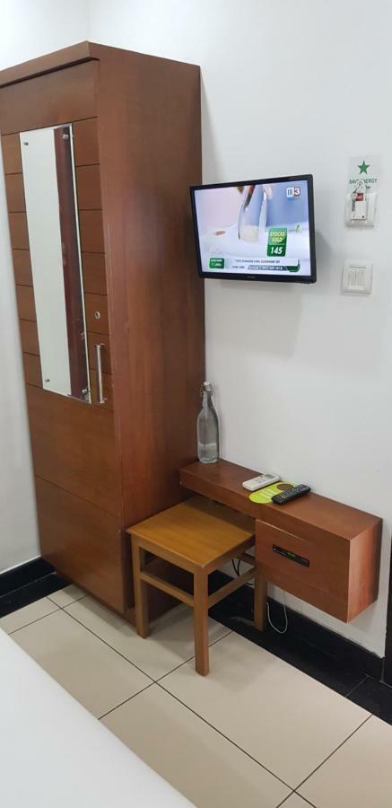 Pgs Inn Kochi Buitenkant foto